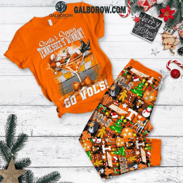 Tennessee Volunteers Santa’s Sipping Tennessee Winnin’ Christmas Fleece Pajamas Set